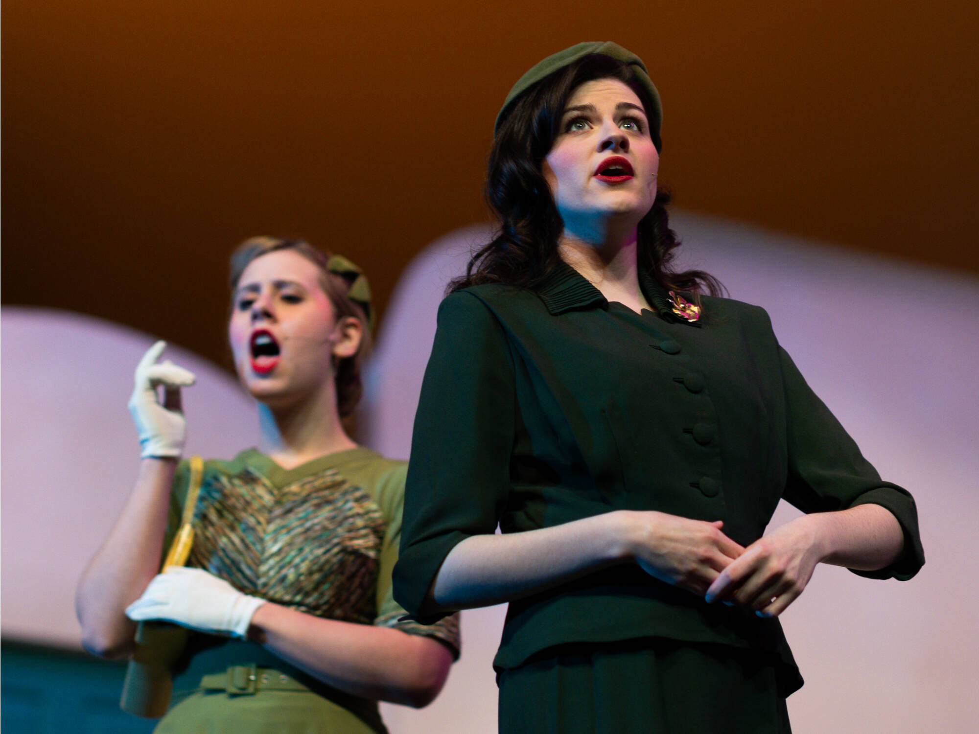 two singers on stage